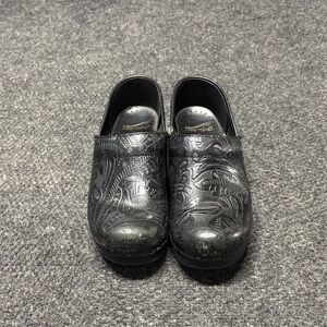 Dansko Black Embossed Leather Clogs